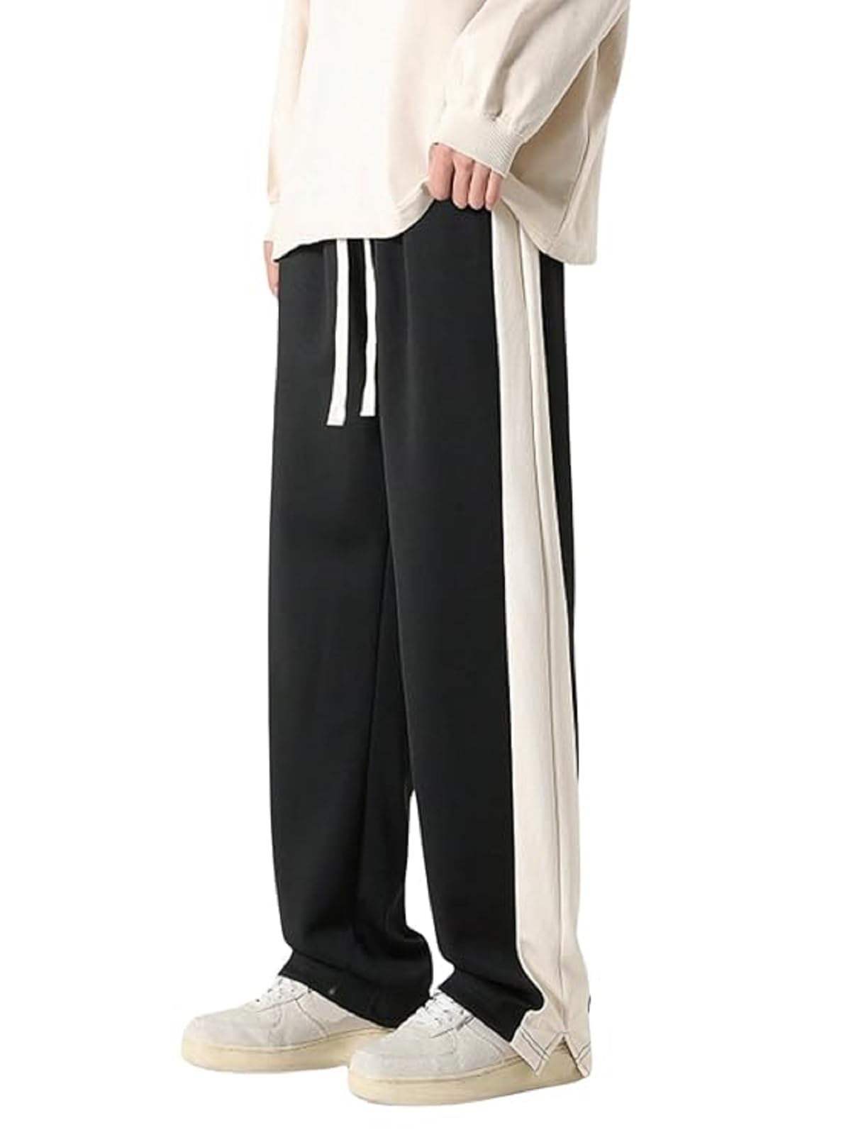 GreciiLooks men's loose fit mid-rise casual track pants by SnatchStyle, sports stylish sweatpants in black with side pockets.