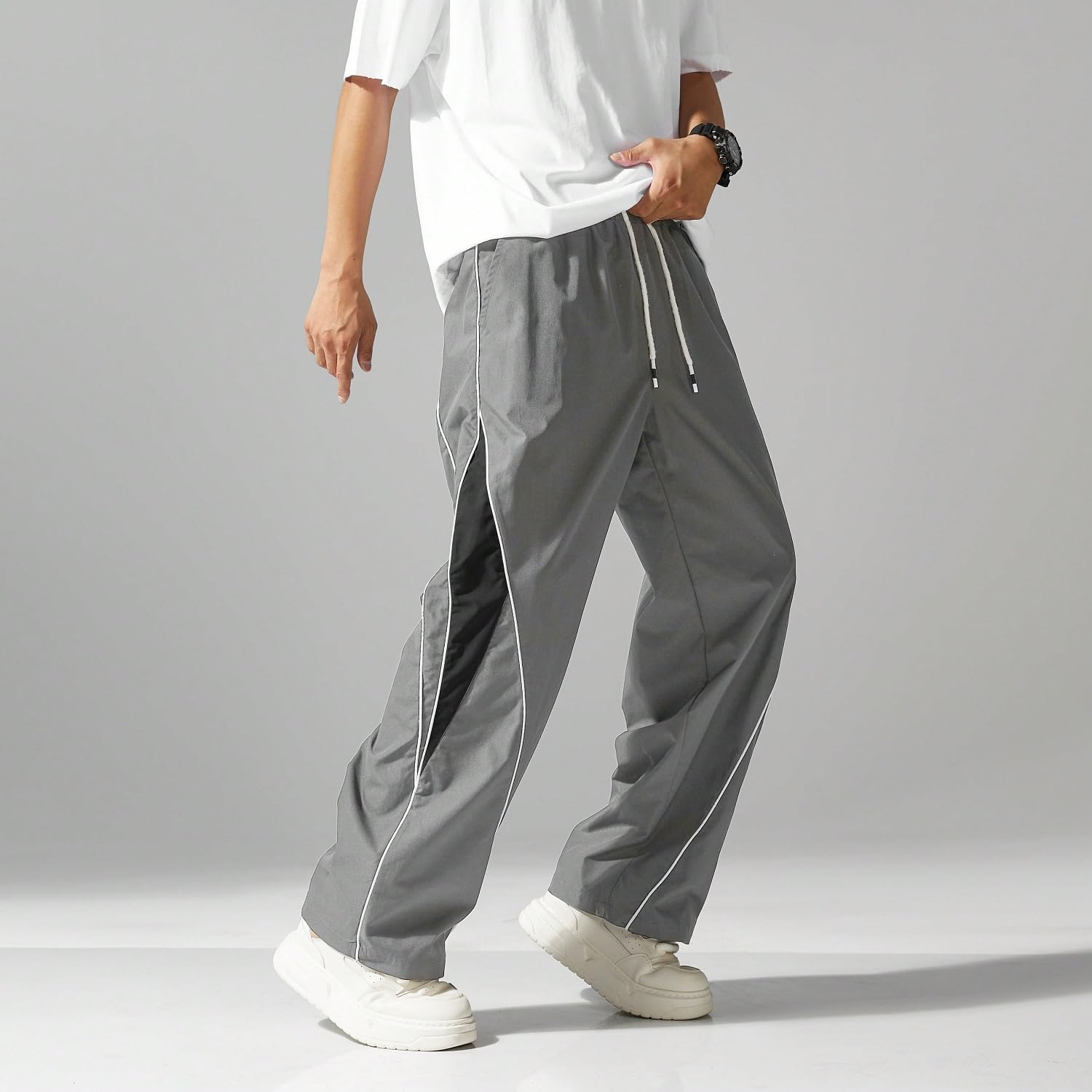 SnatchStyle Lymio men's track pant with stylish design, loose fit, and comfortable fabric, shown in a relaxed casual style.
